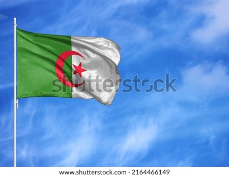 National flag of Algeria on a flagpole
