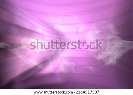 Abstract pink background. Blurred background curved lines pink tint.