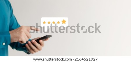 User give rating to service experience on online application, Customer review satisfaction feedback survey concept, Customer can evaluate quality of service leading to reputation ranking of business. Royalty-Free Stock Photo #2164521927