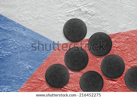 Washers and the image of the Czech flag on a hockey rink