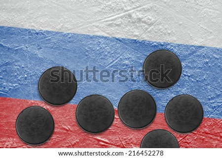 Washers and the image of the Russian flag on a hockey rink