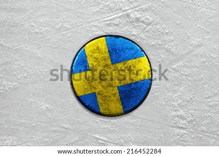 Washer with the image of the Swedish flag on a hockey rink