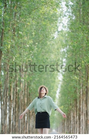 asian woman happy with travel and relax at outdoor on spring season