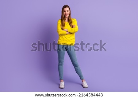 Full size photo of young cheerful woman folded hands standing wear modern outfit isolated over purple color background