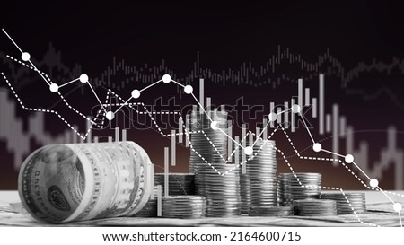 Financial economic crisis. Coins with economic graph chart falling due to covid-19 pandemic, stock market crash Royalty-Free Stock Photo #2164600715