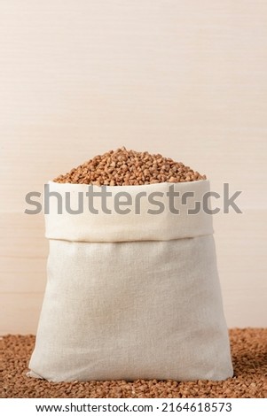 Export of buckwheat. Reducing the export of buckwheat and cereals. World food crisis. Hunger and lack of food. Ban on the export of grain and agricultural products. Royalty-Free Stock Photo #2164618573