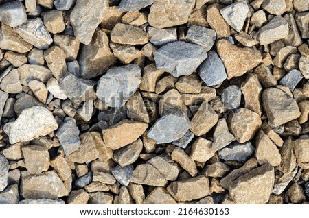 Abstract background with large pebbles. The concept of relaxing on the beach. High-quality photography