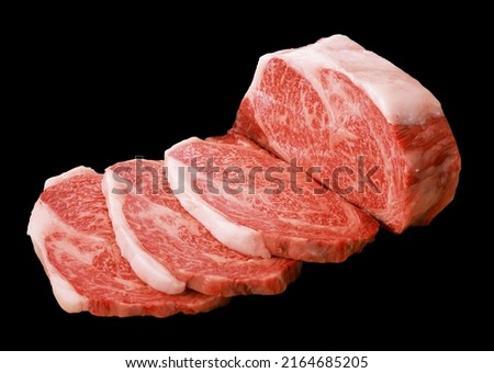 Raw freshly cut  Boneless Ribeye Steak cut into pieces Ready to Cook, Isolated on black background