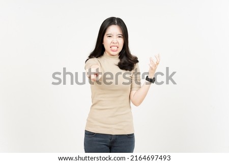 Pointing to You and Angry Gesture Of Beautiful Asian Woman Isolated On White Background