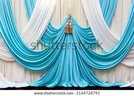 blue and cream white curtain on stage background in textile pattern concept
