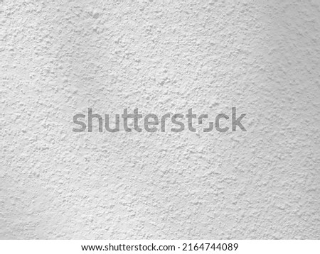 Seamless texture of white cement wall a rough surface, with space for text, for a background..	