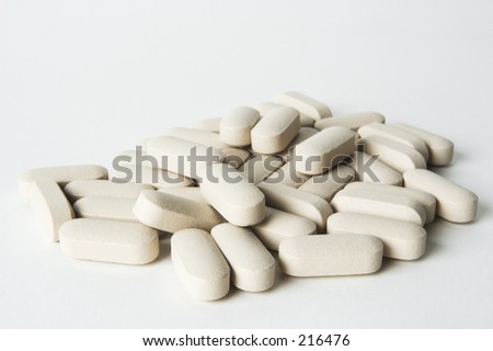 A collection of pills on white