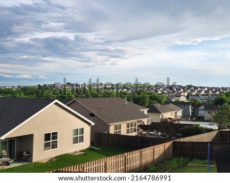 Selective focus of a neighborhood with skyline included of the suburbs in Omaha, Nebraska 