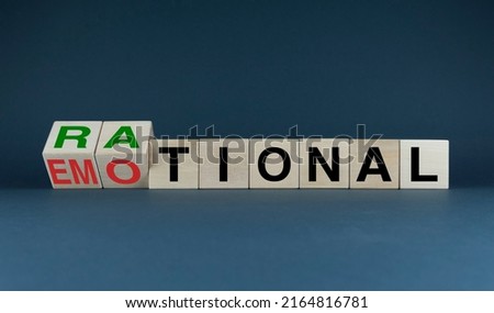 Rational or Emotional. Cubes form the choice words Rational or Emotional. Concept of decision-making, reactions and psychology Royalty-Free Stock Photo #2164816781