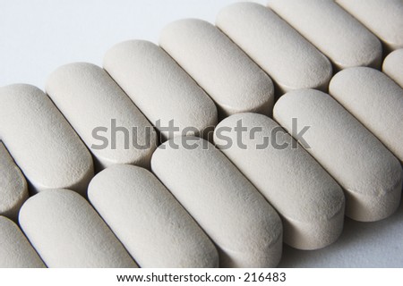 Pills lined up in two rows