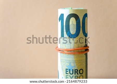 Close-up of twisted one hundred euro bills, 100 Euro bill, business concept picture