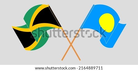 Crossed and waving flags of Jamaica and Palau. Vector illustration
