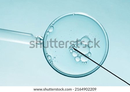 In vitro fertilisation concept. Artificial insemination or fertility treatment macro photography.  Royalty-Free Stock Photo #2164902209