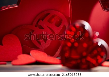 Valentine day greeting card. Hearts on the wooden background