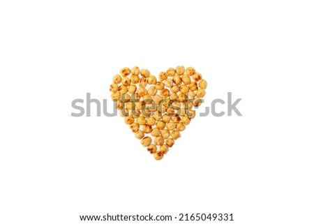 Roasted Chickpeas in heart shape on white background. Design element, template background or screensaver for cooking books.  Turkish healthy snack.