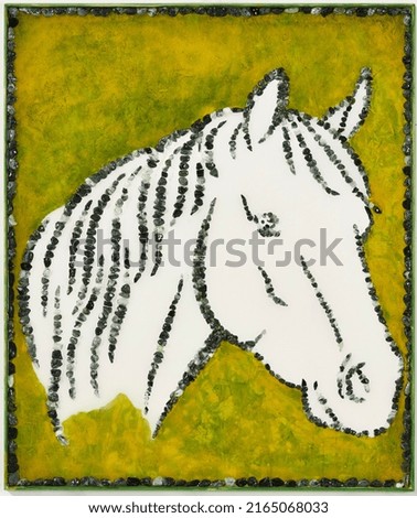 head of white horse in the green