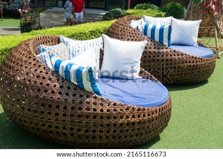 Outdoor artificial rattan sofa. Outdoor seating.