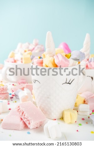 Rainbow unicorn hot chocolate with colorful marshmallows