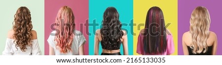 Young women with beautiful dyed hair on colorful background, back view Royalty-Free Stock Photo #2165133035