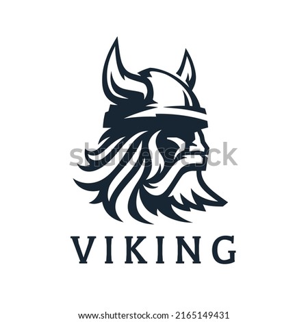 Viking logo design. Nordic warrior symbol. Horned Norseman emblem. Barbarian man head icon with horn helmet and beard. Brand identity vector illustration. Royalty-Free Stock Photo #2165149431