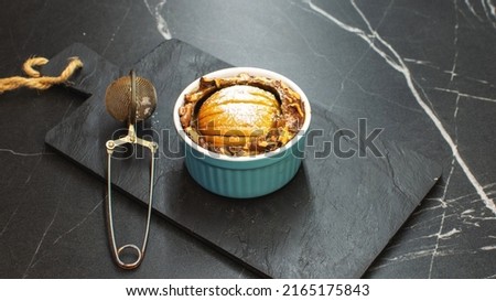 Homemade apple pie pastry on stone table. Bakery and dessert concept