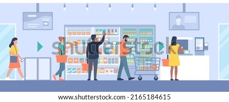 People doing grocery shopping at the supermarket and using an innovative self-checkout Royalty-Free Stock Photo #2165184615