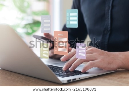 Business people working with computers and smartphones A symbol of top service ISO Certification Document Management System Quality assurance. Royalty-Free Stock Photo #2165198891