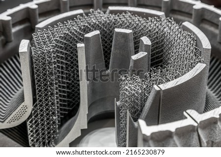 part of the housing of the first engine support made on a 3D printer printed with powder metals. the method of direct laser cultivation Royalty-Free Stock Photo #2165230879