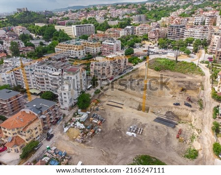 Busy Construction Site and Construction Equipment Aerial view
