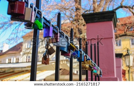 Locks on barrier at urban background as sign for forever friendship and love. Lovers best place. 