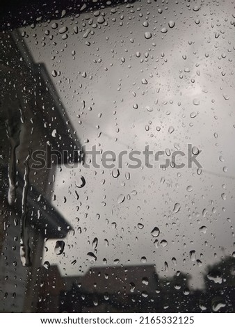 raindrops dripping on the windshield