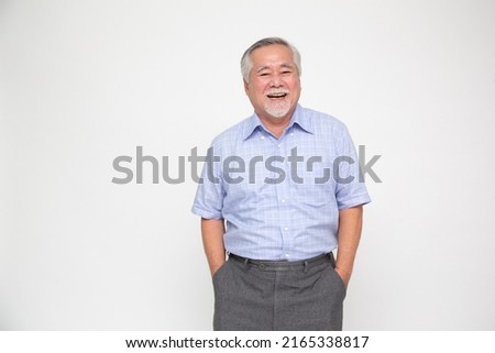 Portrait of senior asian man smile and looking at camera isolated over white background, Feeling happy concept Royalty-Free Stock Photo #2165338817