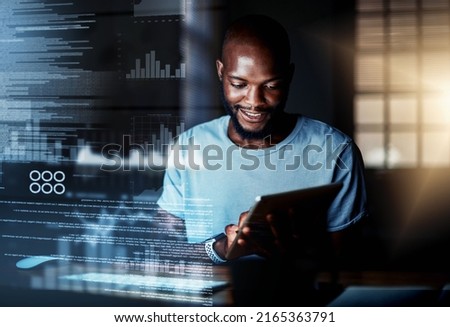 Deciphering new data. Shot of a programmer using a digital tablet while working on a computer code at night. Royalty-Free Stock Photo #2165363791