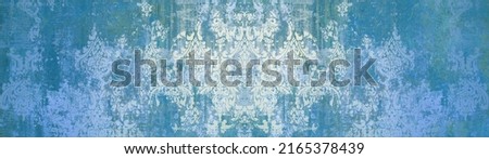 Old blue white arabesque vintage worn geometric shabby mosaic ornate patchwork motif porcelain stoneware tiles stone concrete cement wall wallpaper texture background banner panorama Royalty-Free Stock Photo #2165378439