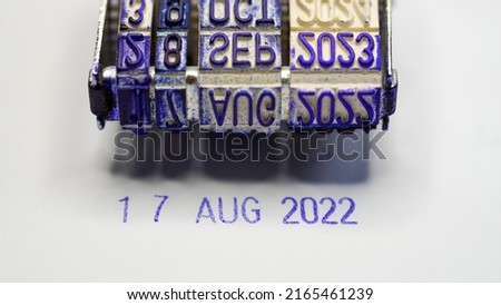 Stamp of August 17, 2022. Isolated focus on the stamp. Date stamp macro photo. 17 Agustus 2022.