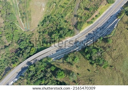 aerial images of roads and landscapes