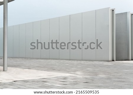 empty ground floor in front of modern architecture exterior. Royalty-Free Stock Photo #2165509535