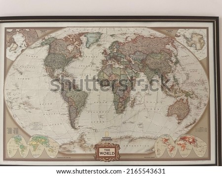 
an antique world map painting