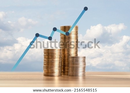 Close up Photo of constantly increasing coins on isolated background. Concept of rising money and climbing investment of new startup.