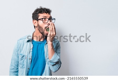 Person with bad breath problem, Concept of person with halitosis and bad breath, a guy with bad breath and halitosis problem Royalty-Free Stock Photo #2165550539