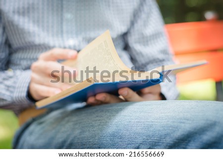 book in hand closeup