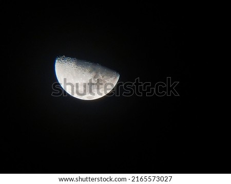Background Half Moon Moon is an astronomical body orbiting planet Earth, being the only permanent natural satellite on Earth.