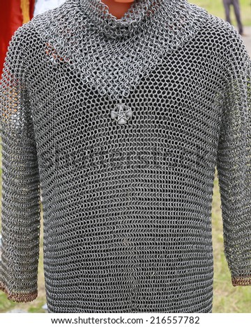 macro texture seamless chain mail made of metal Royalty-Free Stock Photo #216557782