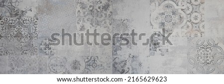 Old gray grey vintage worn geometric shabby mosaic ornate patchwork motif porcelain stoneware tiles stone concrete cement wall texture background banner panorama Royalty-Free Stock Photo #2165629623