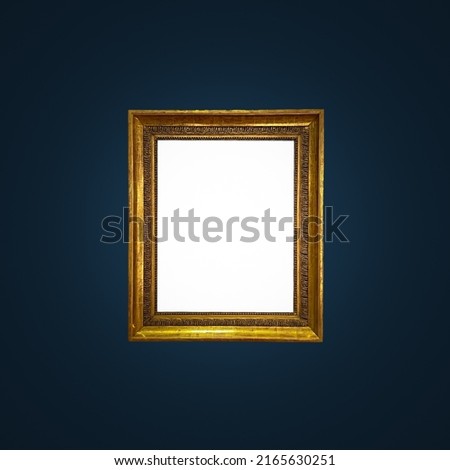 Antique art fair gallery frame on royal blue wall at auction house or museum exhibition, blank template with empty white copyspace for mockup design, artwork concept